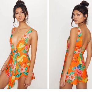 Pretty little thing Orange Tropical Print Wrap Short Romper playsuit NEW